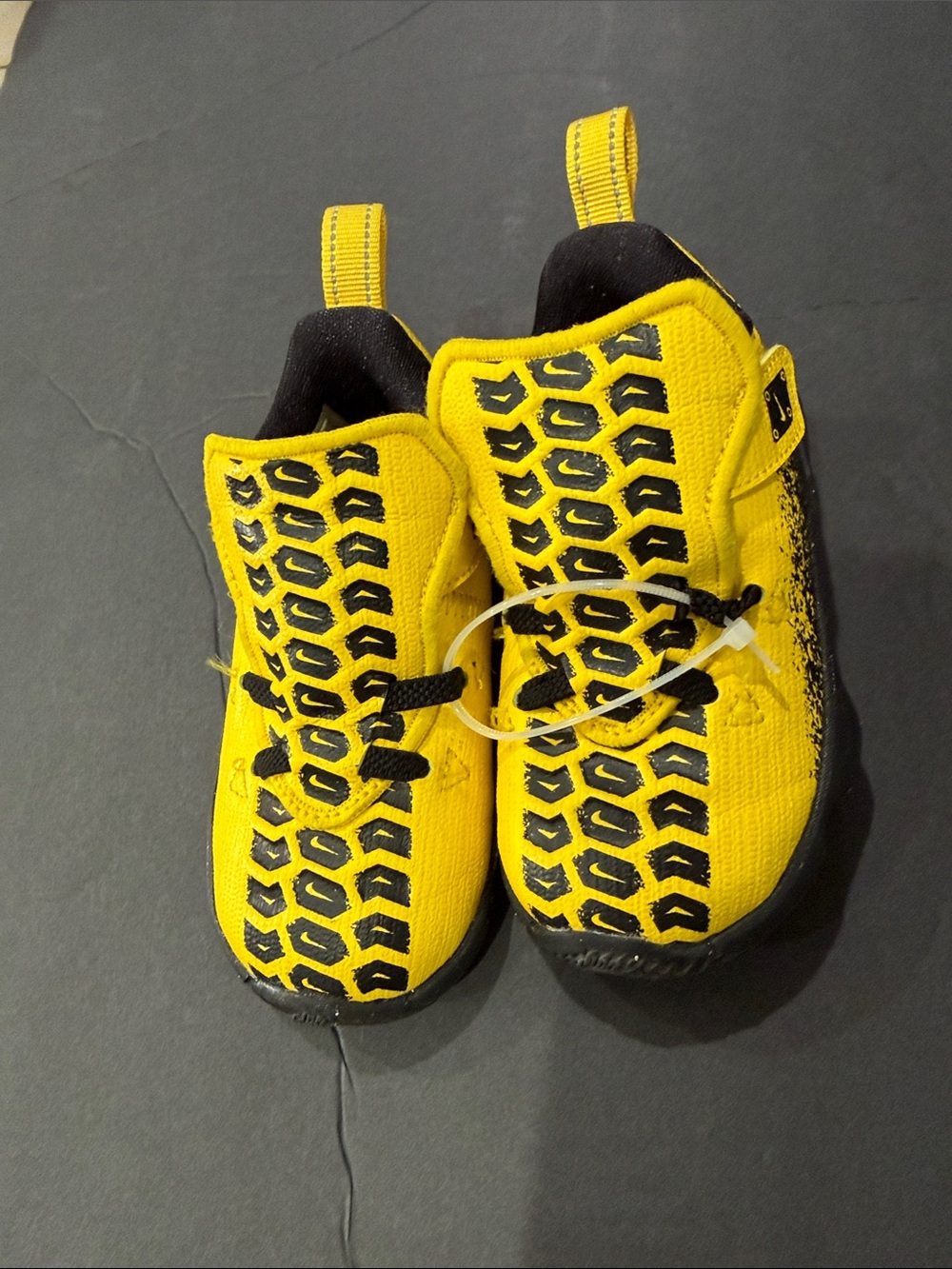 Nike LEBRON  toddler sneakers in yellow and black.